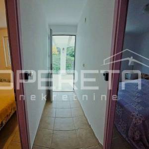 Stan s 2 sobe i terasom, 7 m do mora, pogled na more, Račišće, Korčula
