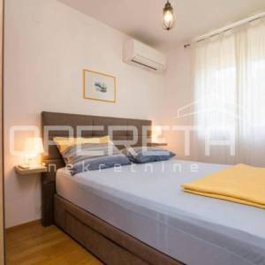 Uređen trosoban stan s privatnim vrtom i terasom, 89 m², prizemlje, Mocire, Zada