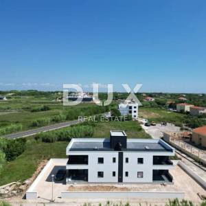 ZADAR, PRIVLAKA - Luksuzna stambena zgrada s četiri stana i krovnom terasom s pogledom na more u Privlaci!