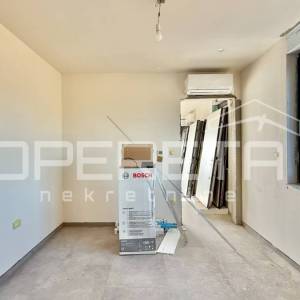 2S apartman u prizemlju s velikim vrtom i terasom