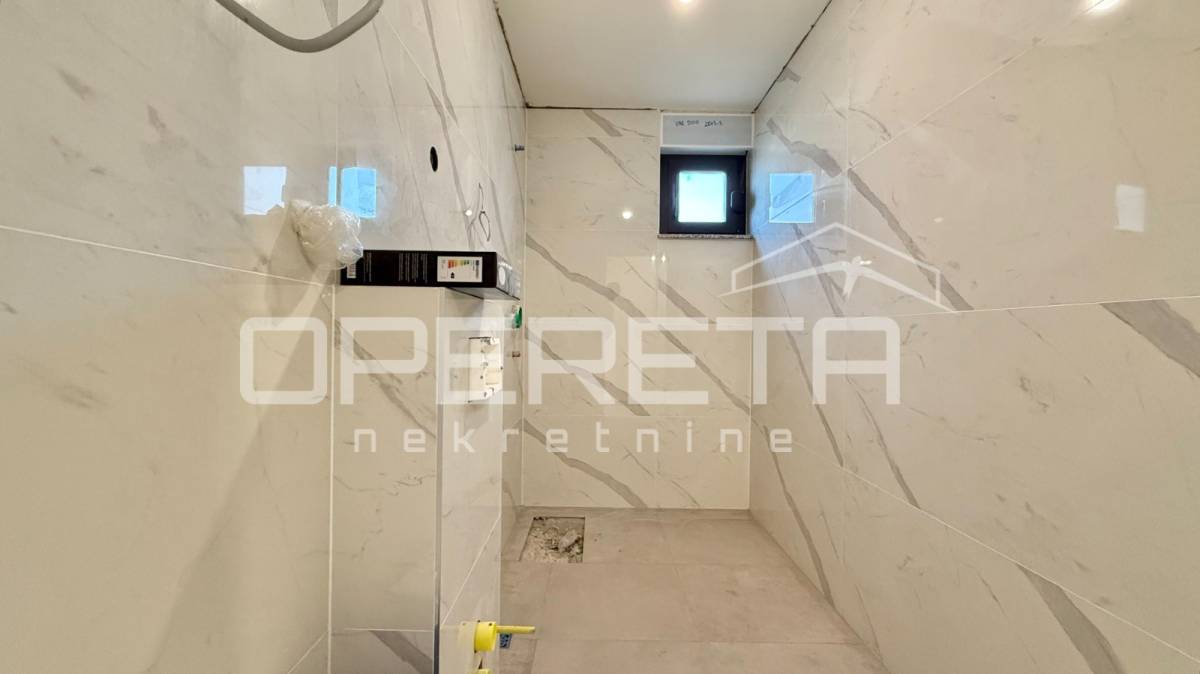 2S apartman u prizemlju s velikim vrtom i terasom