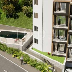 Crikvenica,kuća u nizu sa 4 stana i bazenom