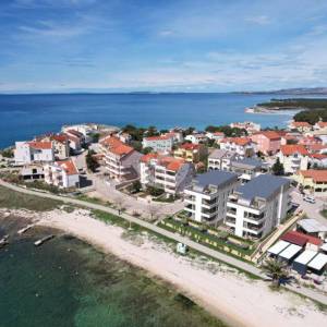 Hrvatska, Pag, Povljana, Luksuzni apartmani, 56.07 m2, Prvi red do mora, S1