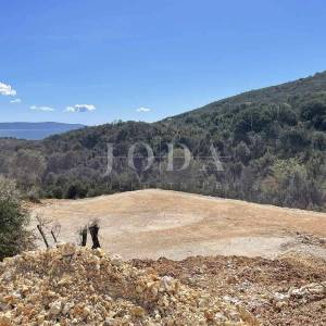 Labin, okolica, građevinski teren sa građevinskom dozvolom i predivnim pogledom na more