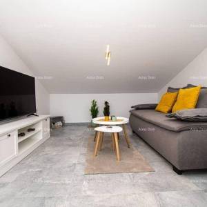 Medulin. Mukalba. Moderan apartman sa velikom terasom i pogledom na more.