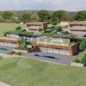 MOTOVUN okolica,građenisko zemljište sa projektom za 4 Ville sa bazenima