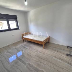 Novogradnja s dvije spavaće sobe i pogledom na more
