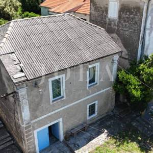 Sveti Juraj kamena kuća na moru