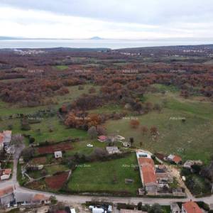 COKUNI, građevinski teren sa riješenim pristupnim putem i građevinskom dozvolom.