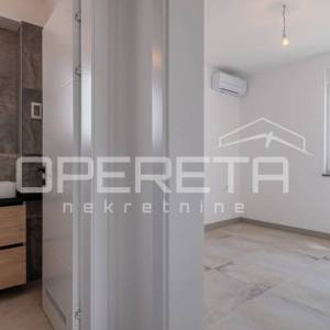 Istra, Banjole - okolica, luksuzan stan sa bazenom i vrtom, 3SS, garaža, blizina