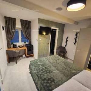 Jednosoban stan na 1.katu i soba s kupatilom u prizemlju s zajedničkom terasom