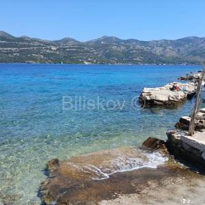 Korčula, prodaja zemljište s objektima, 1.red do mora