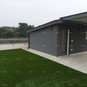 Moderna vila za odmor u zatvorenom kompleksu sa vilama na samoj obali mora.