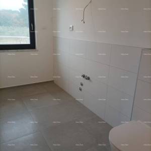 Moderna vila za odmor u zatvorenom kompleksu sa vilama na samoj obali mora.