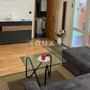 OPATIJA - stan u stambenoj zgradi s vanjskim vrtom i natkrivenom terasom samo 200m od plaže 