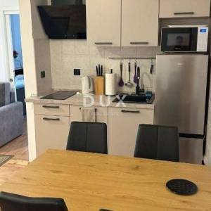 OPATIJA - stan u stambenoj zgradi s vanjskim vrtom i natkrivenom terasom samo 200m od plaže 