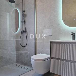 OTOK KRK, MALINSKA (okolica) - Moderna dvojna kuća visokog standarda, s bazenom i uređenom okućnicom