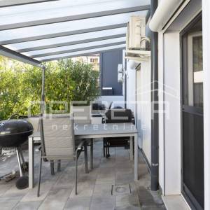 Stan u prizemlju s grijanom bazenom.