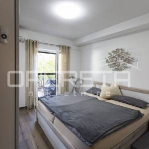 Stan u prizemlju s grijanom bazenom.