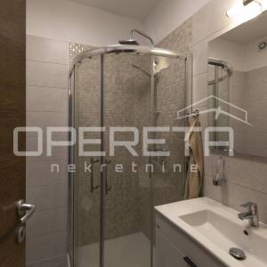 Stan u prizemlju s grijanom bazenom.