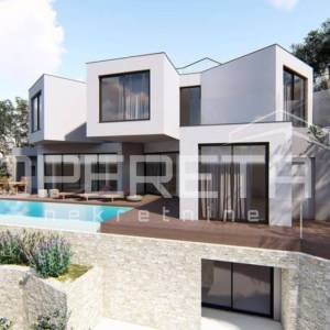 Zemljište s građevinskom dozvolom u Mimicama, 300 m od mora