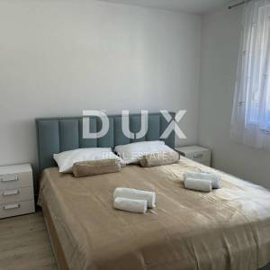 ISTRA, PEROJ - Stan s terasom i pogledom na more! NOVOGRADNJA!