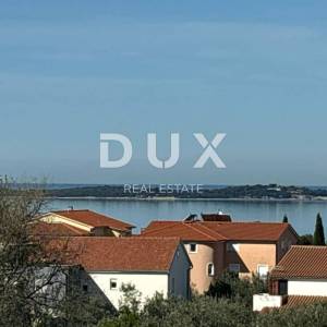 ISTRA, PEROJ - Stan s terasom i pogledom na more! NOVOGRADNJA!