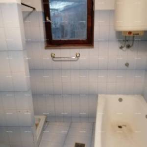 Kuća u centru Marčane s vrtom.