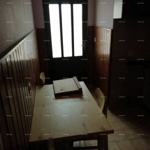 Kuća u centru Marčane s vrtom.