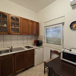 MALINSKA - Dvojna kuća s lijepom okućnicom