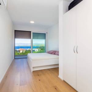 OTOK KRK, MALINSKA - Luksuzni penthouse s bazenom i panoramskim pogledom na more