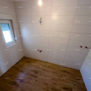 Prodaja stana s vrtom i parkirim mjestom, novogradnja, Brtonigla!