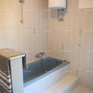 Prostrana kuća u Premanturi s pet spavaćih soba i vrtom, idealna za obitelj ili investiciju