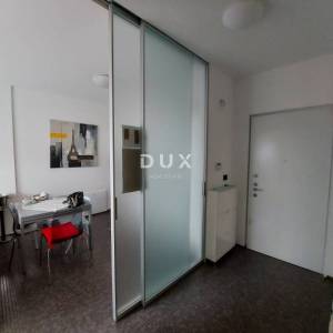 RIJEKA, CENTAR - Kompletno uređeni stan u zgradi s liftom i garažom!