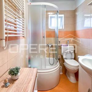 Stan s vrtom i garažom prenamijenjenom u stambeni prostor