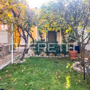 Stan s vrtom i garažom prenamijenjenom u stambeni prostor