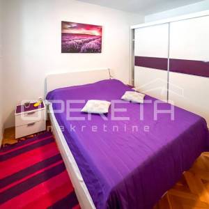 Stan s vrtom i garažom prenamijenjenom u stambeni prostor