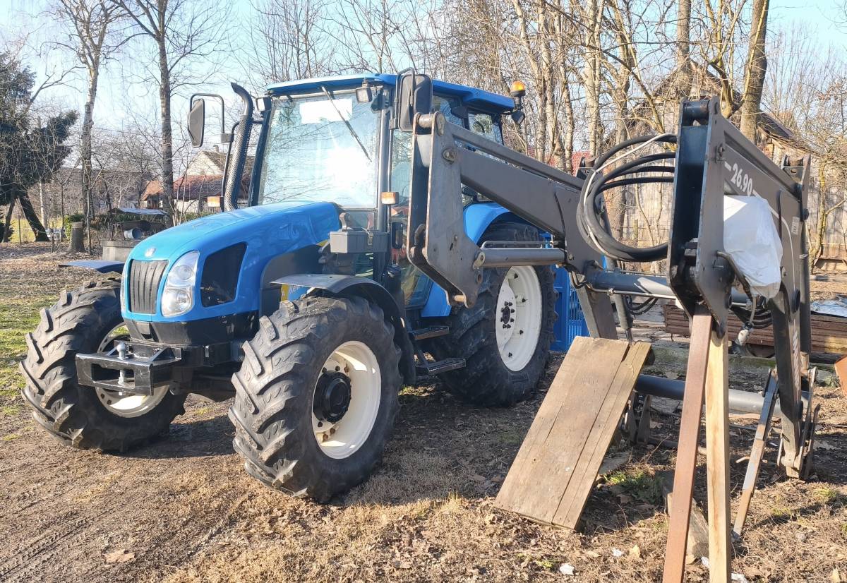 New Holland TL90 + prednji utovarivač + gajba