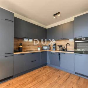 OPATIJA, OPRIĆ - stan u novogradnji s vrtom i pogledom na more