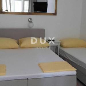 OTOK PAG, NOVALJA - villa s 20 apartmana udaljena samo 300 metara od mora! PRILIKA!