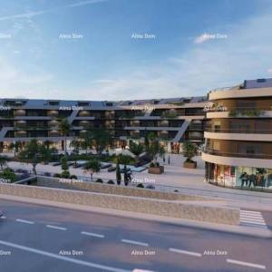 Poreč, stambeno poslovni objekt u gradnji sa apartmanima i podzemnim garažama