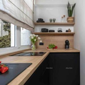 Prodaje se dizajnerski stan u centru grada!