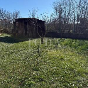 Dvojna kuća s poslovnim prostorom i garažom