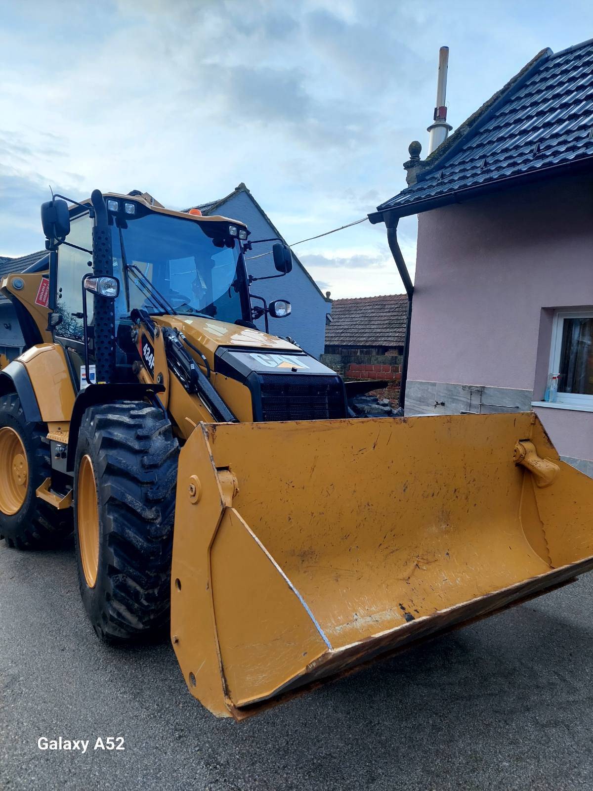 Kombinirka Caterpillar 434F2