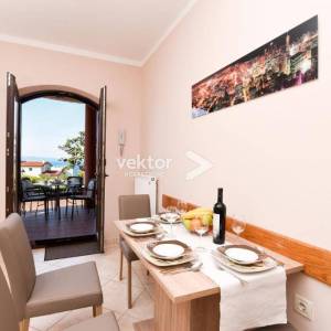 Kostrena, kuća novije gradnje sa četiri stana, otvoren pogled na more