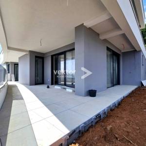 Lovran, stan s okućnicom i pogledom na more, novogradnja