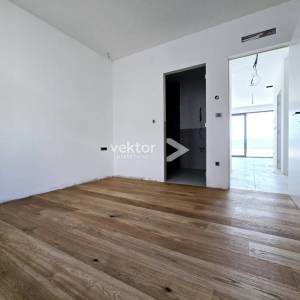 Lovran, stan s okućnicom i pogledom na more, novogradnja