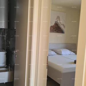 Moderan apartman u bloku F, s dva parkirna mjesta i spremištem, u blizini Umaga!F2