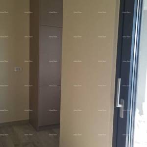 Moderan apartman u bloku F, s dva parkirna mjesta i spremištem, u blizini Umaga!F2