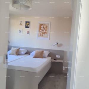 Moderan apartman u bloku E s parkirnim mjestom i spremištem, u blizini Umaga!